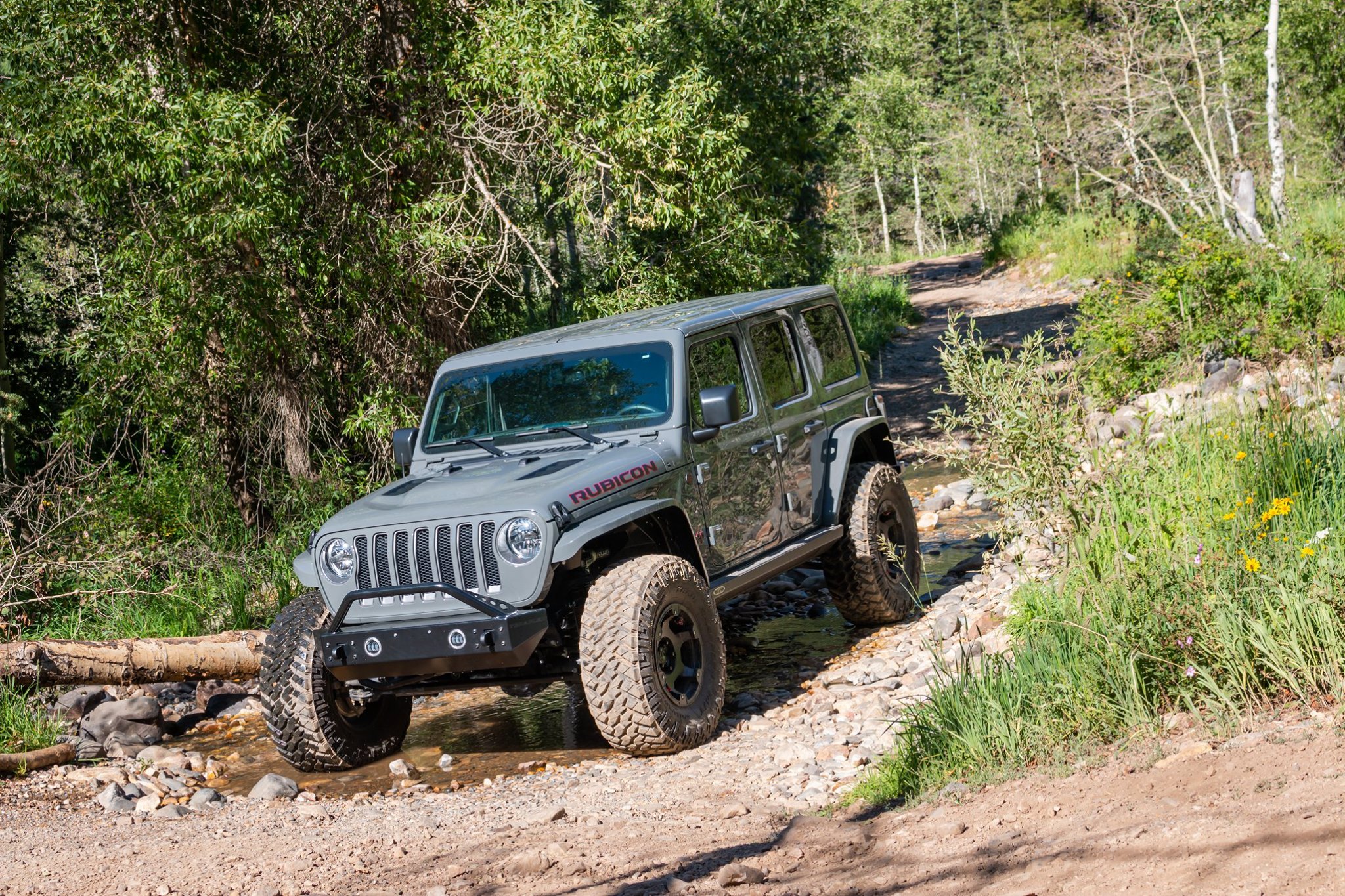 What lift kit should I buy to run 35 or 37 Inch Tires on My JL or JLU  Wrangler? - 4X Store